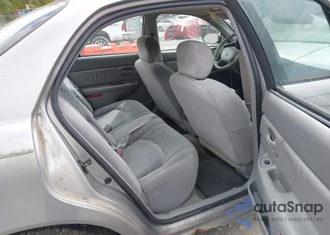 1999 Buick Century Custom z USA, uszkodzony, nr VIN 2G4WS52M1X1410771